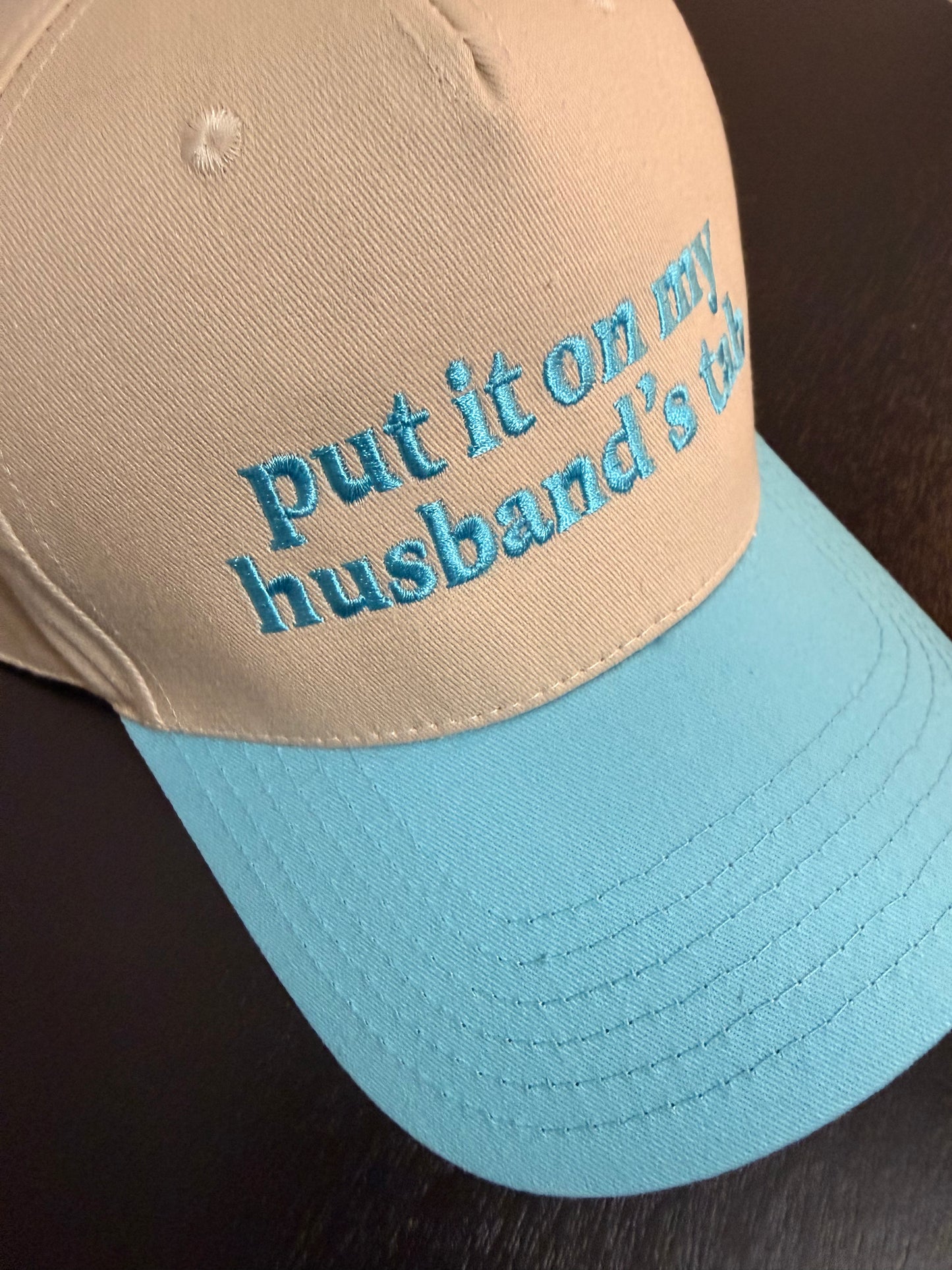 Put It on My Husband's Tab Two-Toned Embroidered Hat